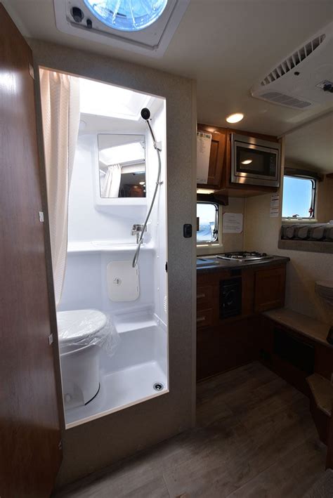 pop up truck camper with shower and toilet